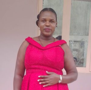 Official portrait of Ms. Atuheire Catherine, the Director of Studies at St. John's S.S - Ikumba.